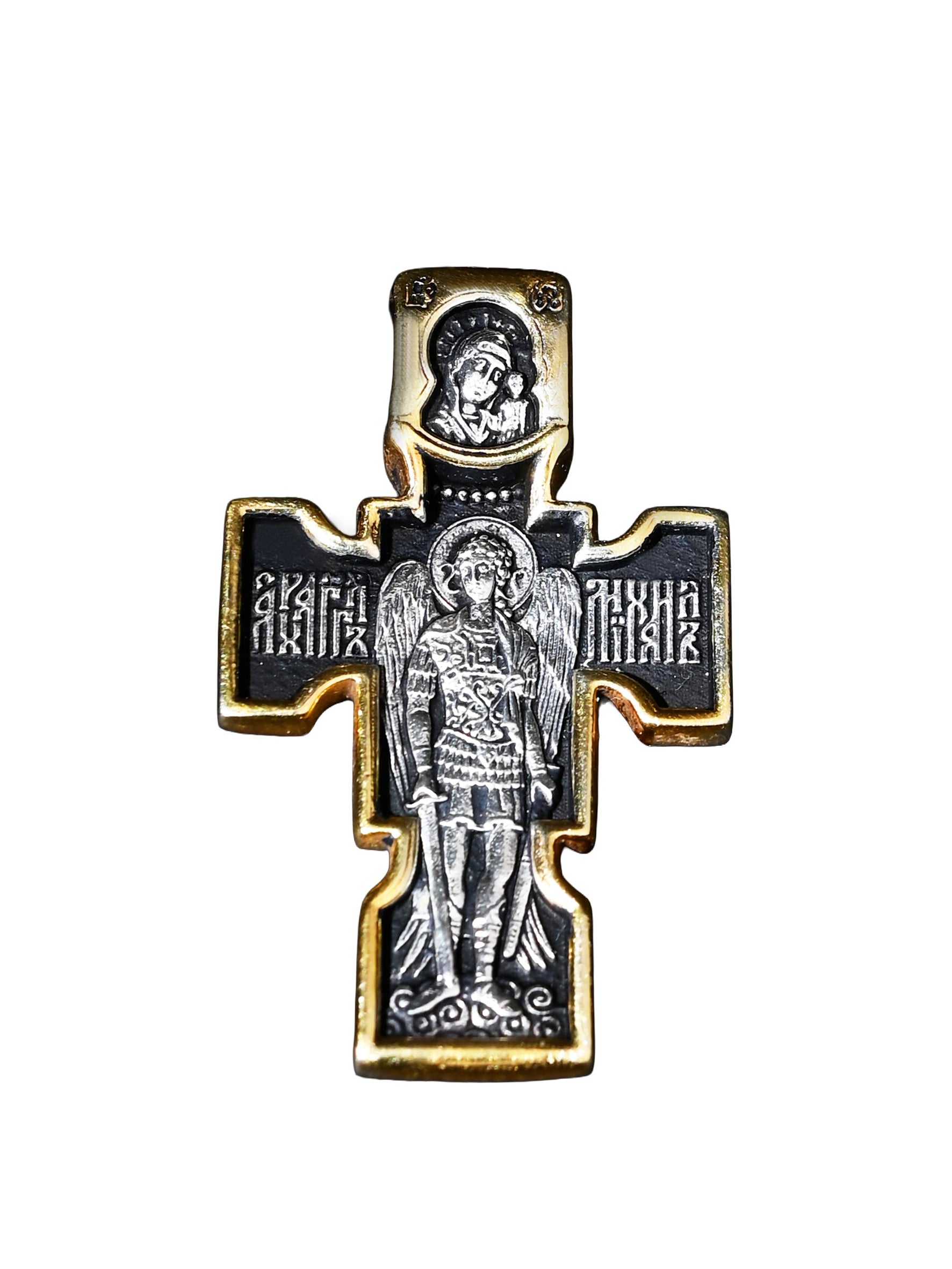 Decorative cross with religious figures on a white background
